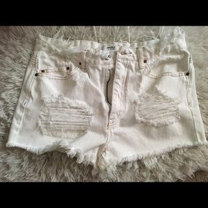 White distressed shorts